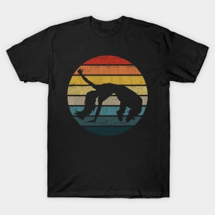 Breakdance Dancer Silhouette On A Distressed Retro Sunset design T-Shirt